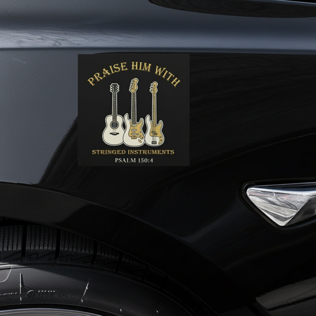 Sticker with guitars and text on a car's black surface